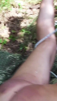 Young Sadist Whips an Old Pig Tied up in the Woods
