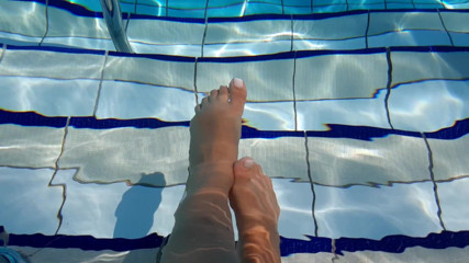 Fetish intimmedia: Foot fetish play in pool