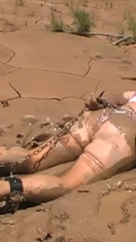 Julie Cunningham in Lingerie Wriggles Hard in Mud Hogtied with Chains. Sploshing Dirty Whore. Huge Tits Covered in Mud.