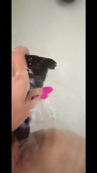 MILF Plays in the Tub with a Big Dildo