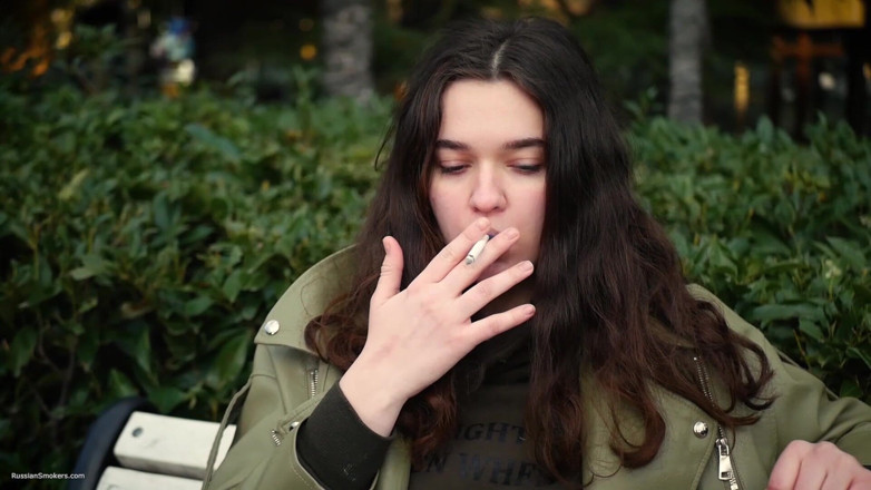 Russian Smokers: Young Brunette Is Taking an Unhurried Stroll with Allwhite 120mm Cigarette
