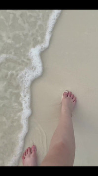 Running my bare feet on the white beach sand by the ocean.