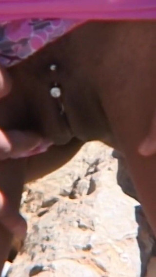 Thumbnail of Canele: Canele Having a Good Piss on the Rock