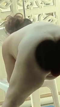 Jade Fucks Her Dildo on the Window