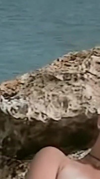 Horny Redhead Babe Fingers Pussy on Wild Beach