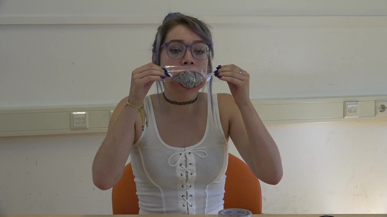 Restricting Ropes: Gagging herself with socks up close