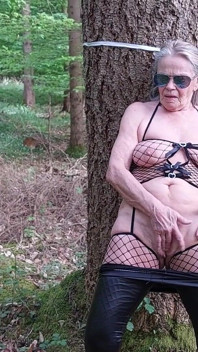 Granny Is Masturbating in the Woods!