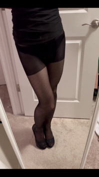 Looking Self in the Mirror in the Poka Dots Black Pantyhose.