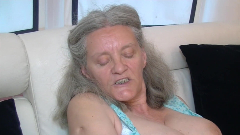 Solo Sex: Busty granny enjoys dildo