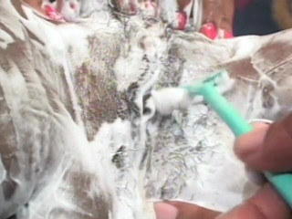 Babe Stars: Black hunk shaves babe's hairy pussy and gives her a...