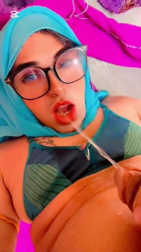 Beautiful Hijabi Transgender Peeing in Mouth