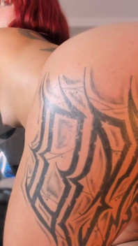 Latina Shakes Her Tattooed Butt