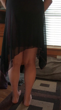T-girl in Cute Minidress Dances Takes off Pantyhose and Teases