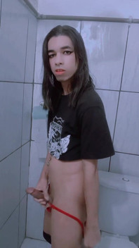 Shemale Slut and Shameless, on Her Knees Sucking Two Cocks at the Same Time