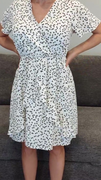 Sadie in a White Dress with Hearts and Red Heels