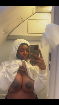 Showing my bare titties and pregnant belly