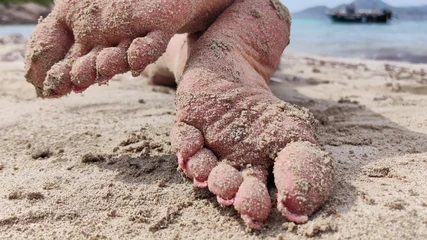 Goddess Lena: Covered in Sand and Above It All