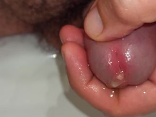 Kinky guy: Close up Pissing and Playing with Peehole