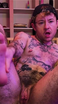 Tattooed Ftm Xxxskips Covers Himself in Oil, Rubs His Bare Feet, Plays with His Trans Pussy Until He Cums