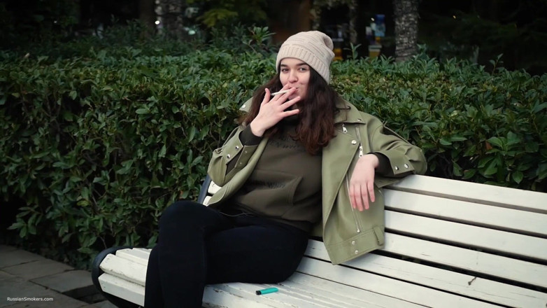 Russian Smokers: Young Brunette Is Taking an Unhurried Stroll with Allwhite 120mm Cigarette