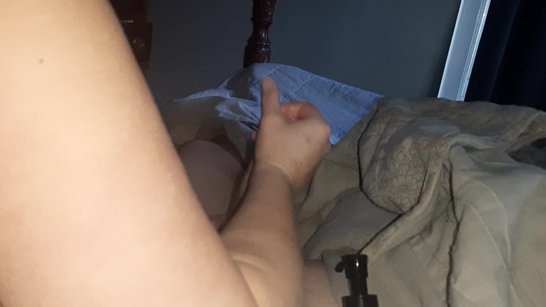 Silky Johnson: Handjob While Playing in Bed