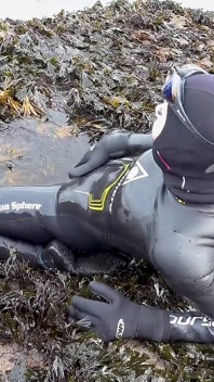 Rubbery Beach Encounter: Lucy's Neoprene Pussy Play with Stranger