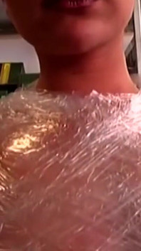 Plastic Wrapped Slut Gaping Wide Through Shiny Film