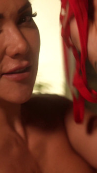 Passionate Kiss of Two Mature Women