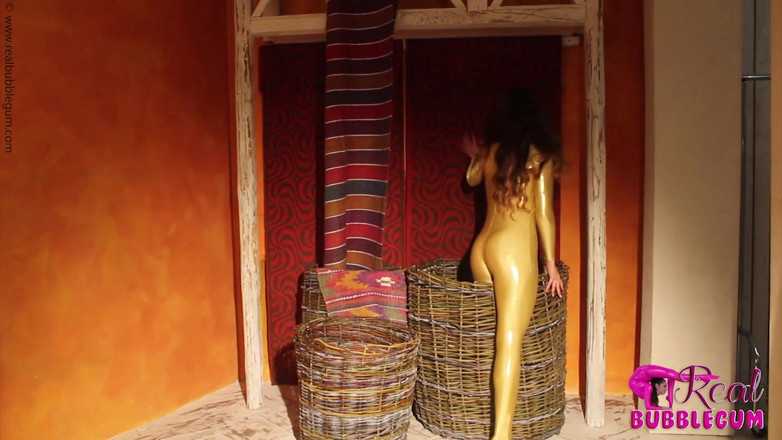 Fem Latex: Snake Woman in the Basket