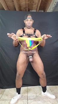 Big Dicked Stud Jerking Huge Cock in Rainbow Print Jock