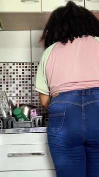 Curvy Girl Farting in Jeans While Doing the Dishes