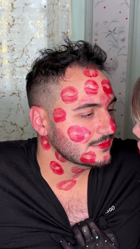 Red Lipstick Kisses Cover His Entire Face