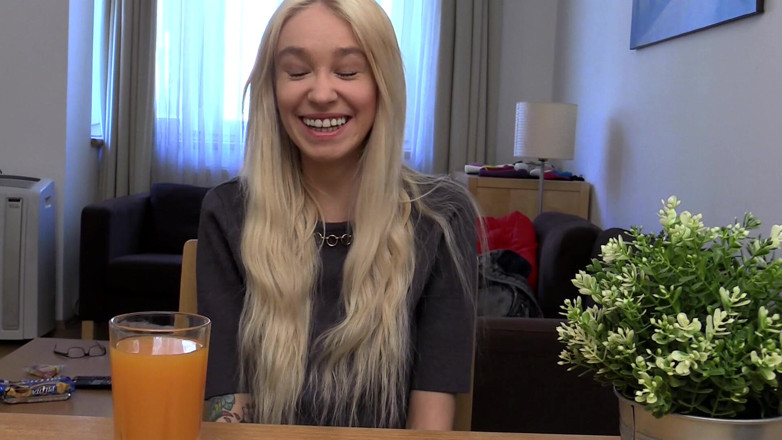 Bitch hunter: Blonde Babe Grips Purple Vibrator with Naughty Smile