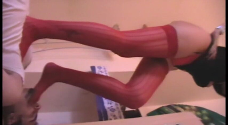 Femdom Austria: Trampling heels in red stockings