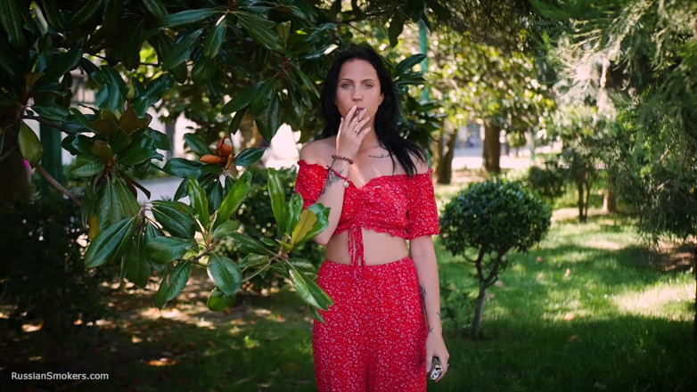Russian Smokers: Sultry Brunette in Red Dress Smoking Rolled Cigarette