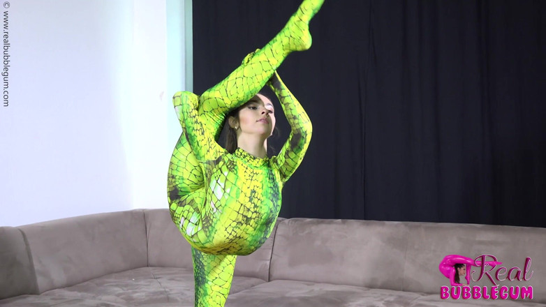 Flexilady: Spineless Lady in Shiny Green Catsuit