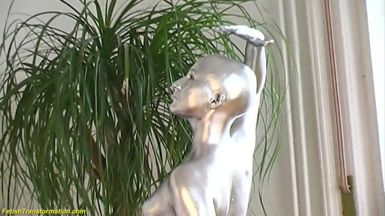 Fetish Islands: Silver metallic painted bald head statue mannequins posing