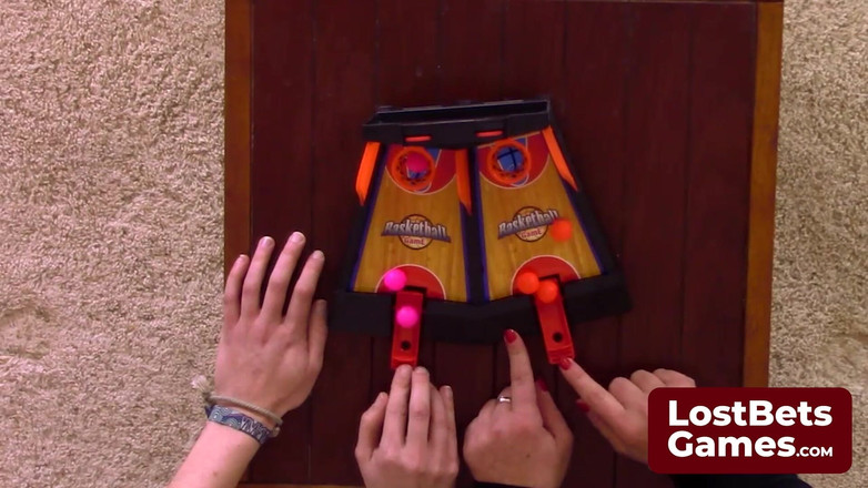 Lost Bets Games: Tobi Shines in This Strip Basketball Flippies Game