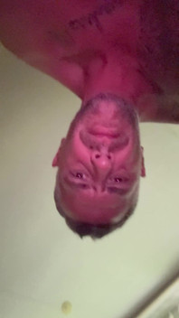 Masturbating