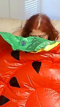BBW Nurse Vicki Blowing up a Huge Plastic Float That Looks Like a Water Melon Slice