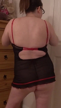 Striptease in Blank Pink Bodice Playing with Breasts