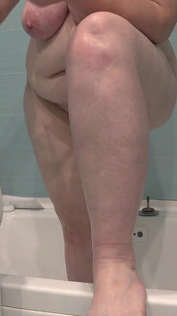 A Bathroom Camera Watches a Mature Wife. a Busty MILF Shaves Her Legs. PAWG.