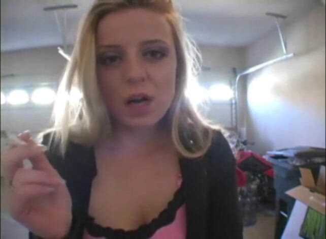 Femdom Austria: Blonde bitch smoking a cigarette in a close up video