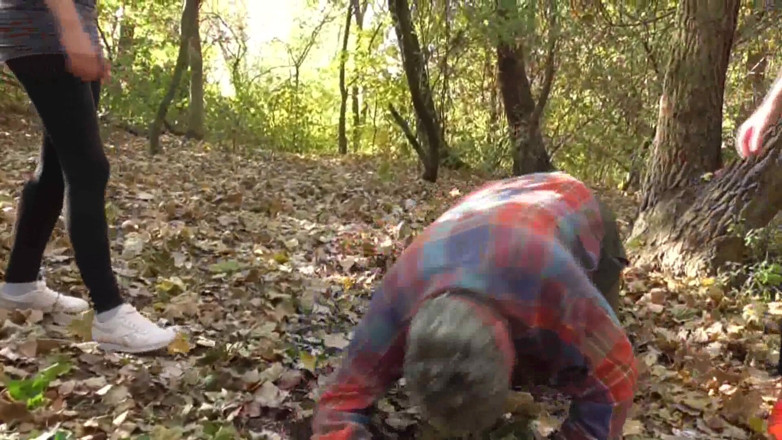 Femdom Austria: Kicking the old slave in the forest