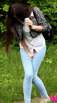 Diana Tries to Hold Her Pee Grabbing Her Crotch While She Is on a Walk Trough a Forest