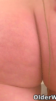 English MILF Fiona Exposes Her Secretary Skills with Her Legs Spread Wide on the Desk