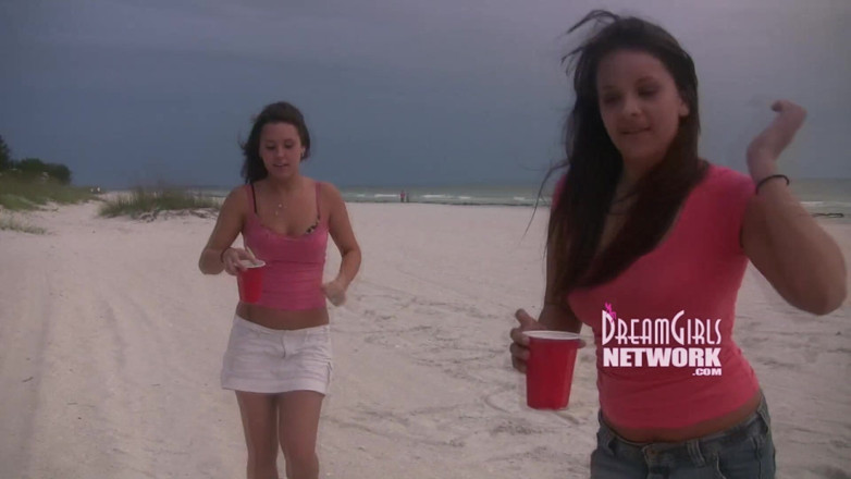 Dream Girls: Vacationers flash on a common beach