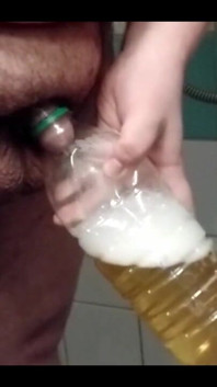 Superchub Pissing in Bottle