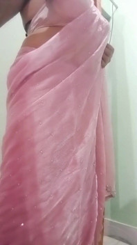 Indian Gay Crossdresser Gaurisissy Pressing and Playing with Her Big Boobs Looking in Pink Saree Looking Like a Housewife