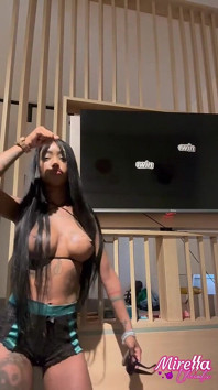 Naughty Girl Showing off the Size of Her Silicone Implants.